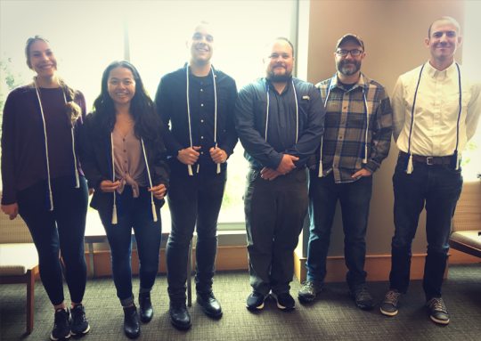 Group of six students standing