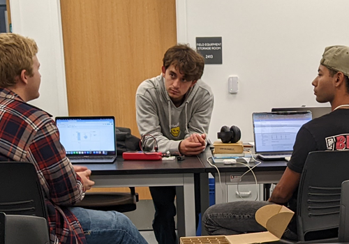 Group of students hanging out in a lab class