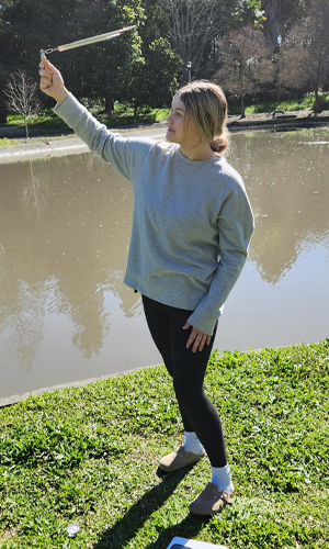 Student using sling psychrometer 