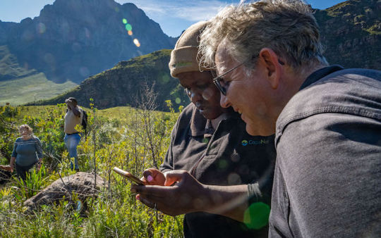 South African student works with Dr. Clark in the field